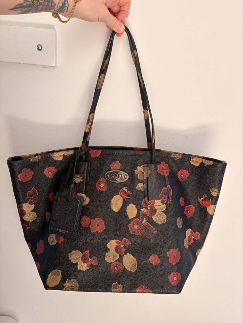 Coach Black Floral Tote with Red and Gold Accents